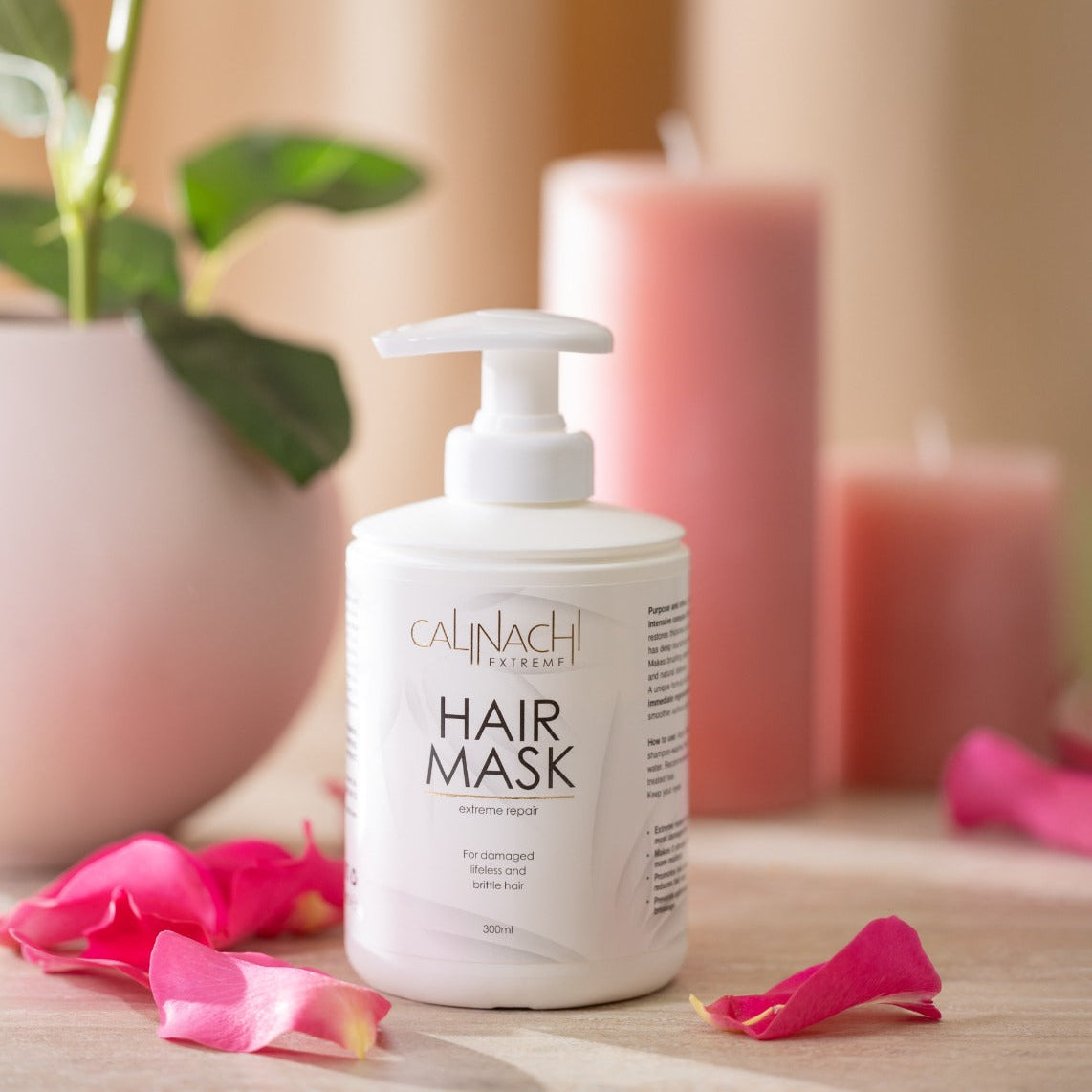 Hair mask bottle with pink roses and candles in the background